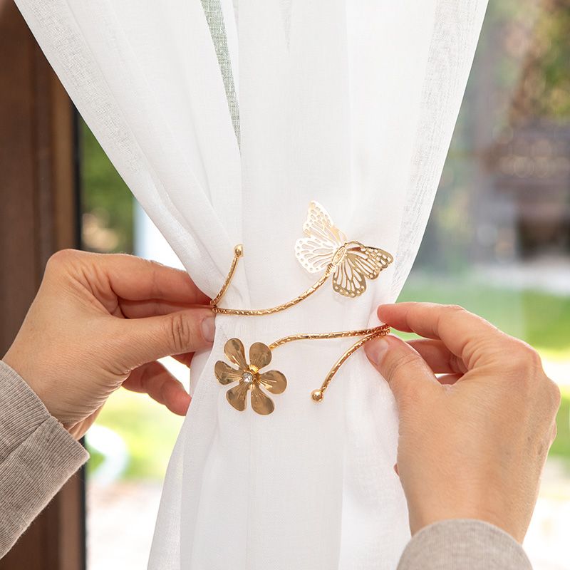 Pillangós függönycsipesz