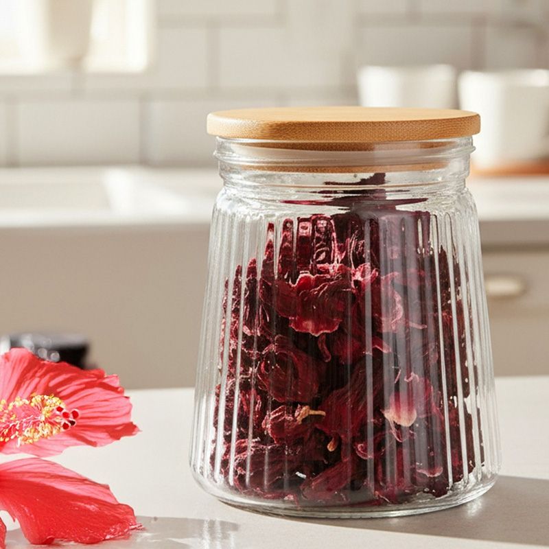 Üveg tárolóedény száraz élelmiszerekhez fedéllel 700 ml